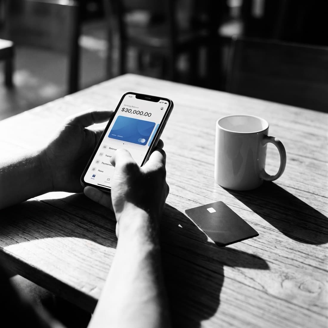 GoTapp app on a phone next to a card